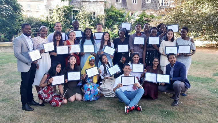 The 2021/22 cohort of students who studied the MSc in International Health and Tropical Medicine gathered together after receiving their certificates after completing the course.