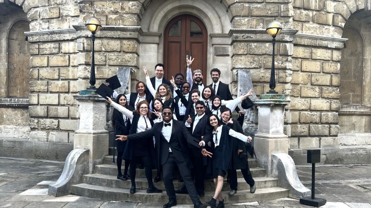 Some of the 2023 cohort of IHTM students gather outside the Radcliffe Camera to matriculate at the start of the academic year