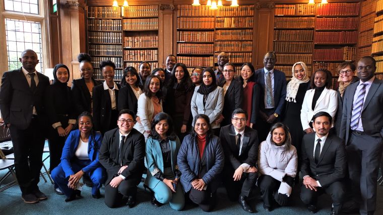 The IHTM 2023 cohort in the Goodman library for the Oxford Union debate.