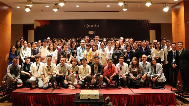 Group photo of the participants to the workshop "Improving access to care for people in Vietnam impacted by Hepatitis C: dissemination workshop to share findings of OUCRU’s community-based participatory research"
